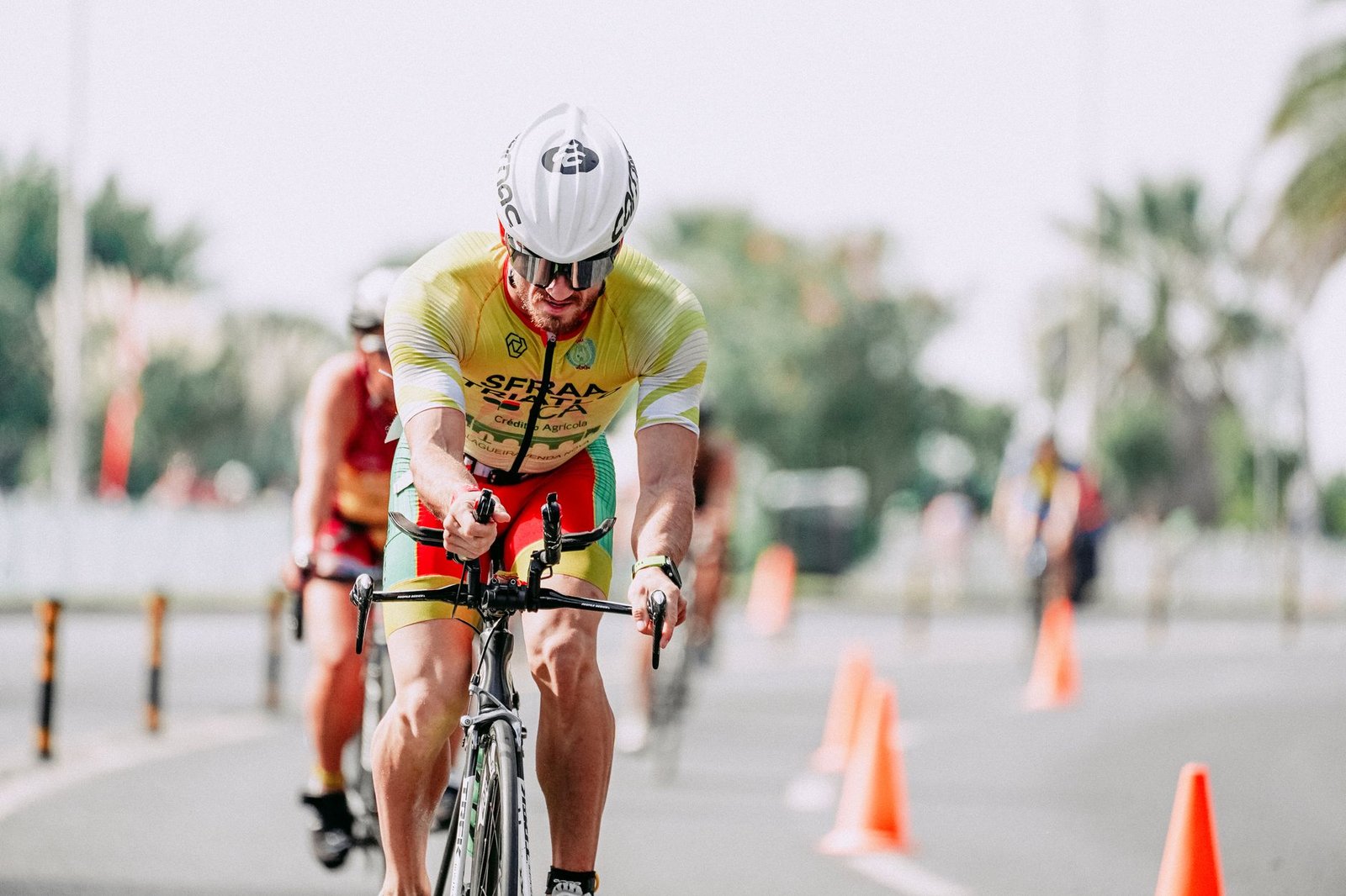 Triathlete adjusting swim goggles before an open water race